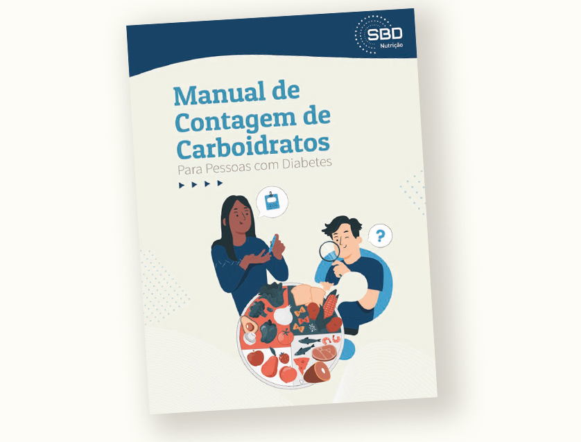 Figura ilustrativa do livro “Manual de Contagem de Carboidratos”, na capa do livro há uma mulher negra de cabelos compridos e um homem branco, na frente deles, em cima da mesa, há uma variedade de alimentos.